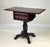 A great example of American Empire design, this 19th-century mahogany drop-leaf work table features a beautifully grained...