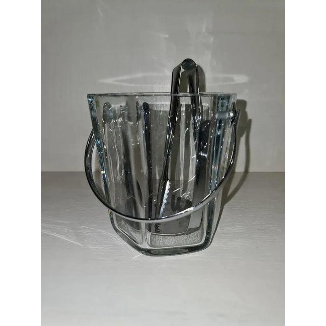 Glass ice cube tray with tongs. The drip plate located in the glass, can be removed, this can be taken out of the device...