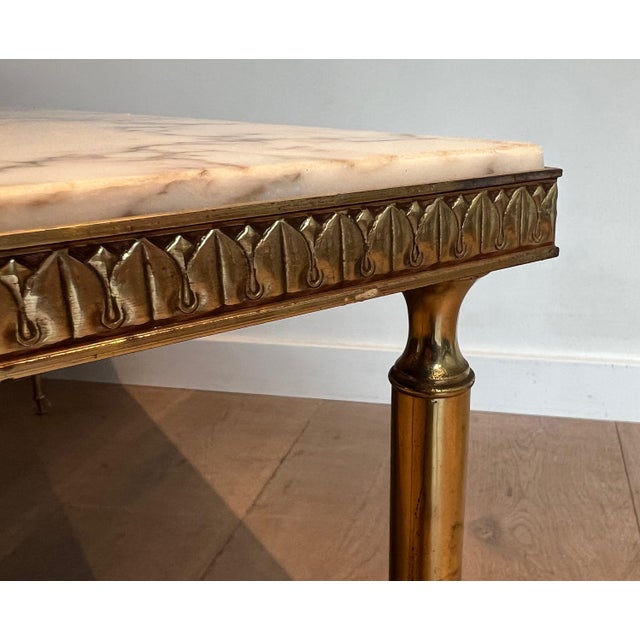This beautiful neoclassical style coffee table is made of brass with lovely decorations all around the gallery surrounding...