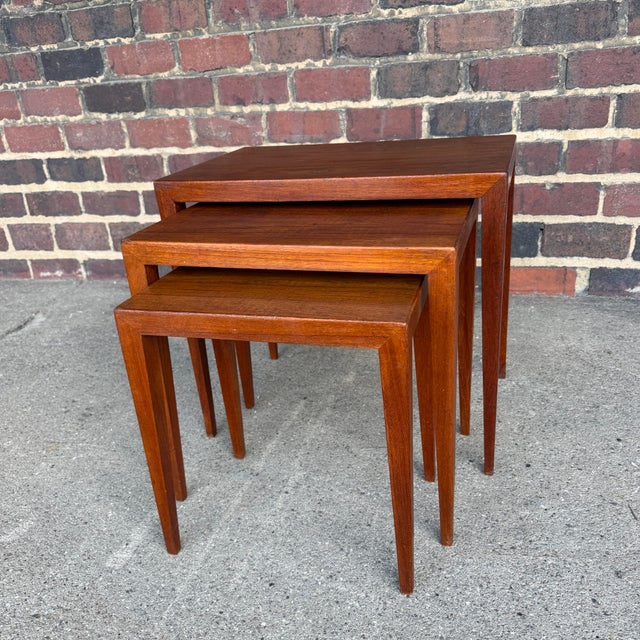 A vintage set of three Danish Modern nesting tables designed by Severin Hansen Jr. for Haslev Møbelsnedkeri. These tables...