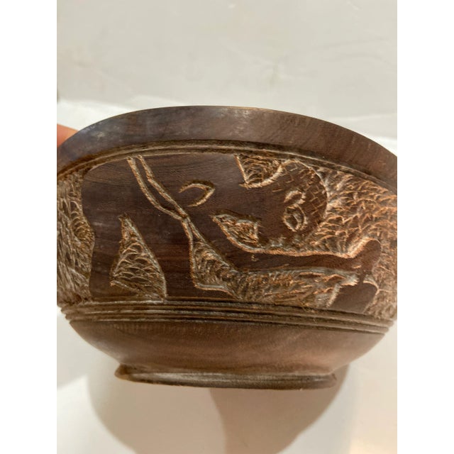 Antique Hand Carved Tribal Relief Wooden Bowl from India. Wooden with hand carved relief, which shows figures performing...