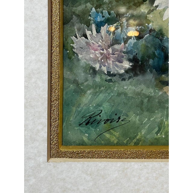 An elegant watercolor signed by François Rivoire (1840-1917), depicting a delicate bouquet of flowers in a soft and poetic...
