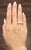 This stunning diamond ring is a timeless expression of elegance, beautifully crafted in 18k white gold. Featuring a...