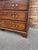 This is a lovely 18th century Georgian chest of drawers with two short and three long drawers. The chest stands on shaped...