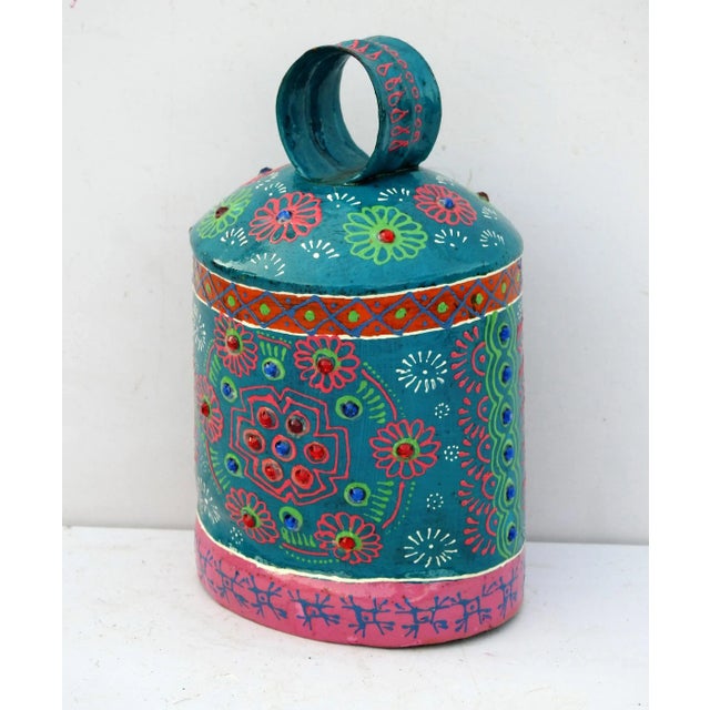 The bell is made of iron and coated primarily with copper, along with a few other metals. They are made from scrap iron...