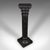 This is an antique torchère. An English, ebonised pine museum stand, jardiniere column or bust plinth, dating to the...