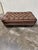 I am in love with this ottoman and its colorway! Ribboned striped silk fabric in rich brown, navy, rust and cream colors....