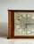 An elegant Kienzle table clock from the 1950s with a mechanical 8-day movement. It features a high-quality veneered wood...