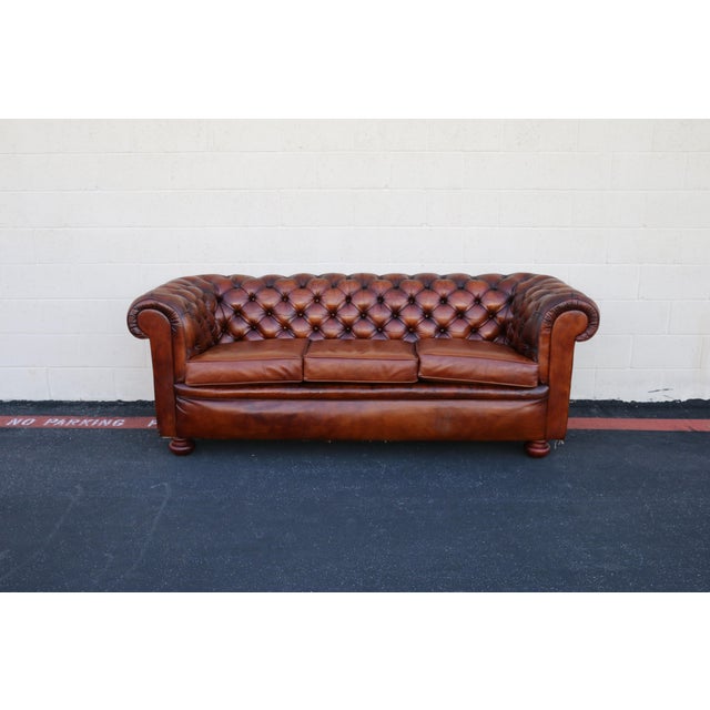 A timeless English classic, this 1940s Pegasus Chesterfield sofa embodies the rich character and craftsmanship that make...