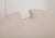 Midcentury Modern upholstered curved lounge chair in light natural/ivory, designed by Federico Munari and produced in...
