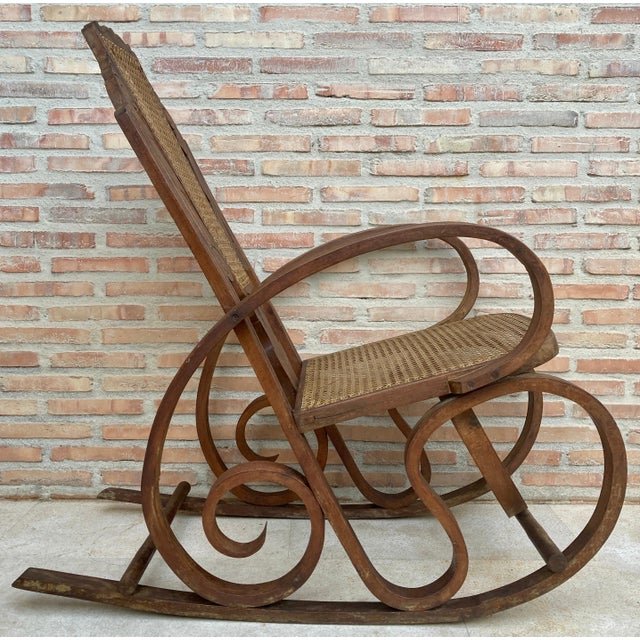 Stunning Art Deco bentwood and reed seats rocking chairs. Design Period 1920 to 1949. Year 1920. Production Period 1920 to...