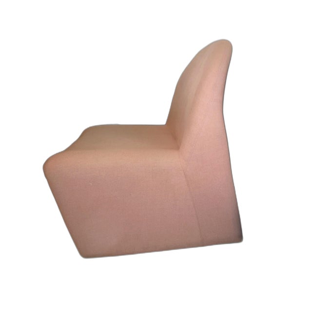 Alky lounge chair designed by Giancarlo Piretti for Artifort, 1980s. Sculptural low-slung form in blush pink upholstery,...