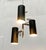 Mid-Century Stab pendant lights of French origin with three beams. The design convinces with its minimalist design...