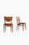 The bo-63 dining chairs, designed by finn juhl and produced by bovirke in denmark in 1952, exemplify the organic...