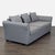 This stylish 3-seat sofa features a sleek gray fabric and three comfortable seat cushions. It comes with three matching...