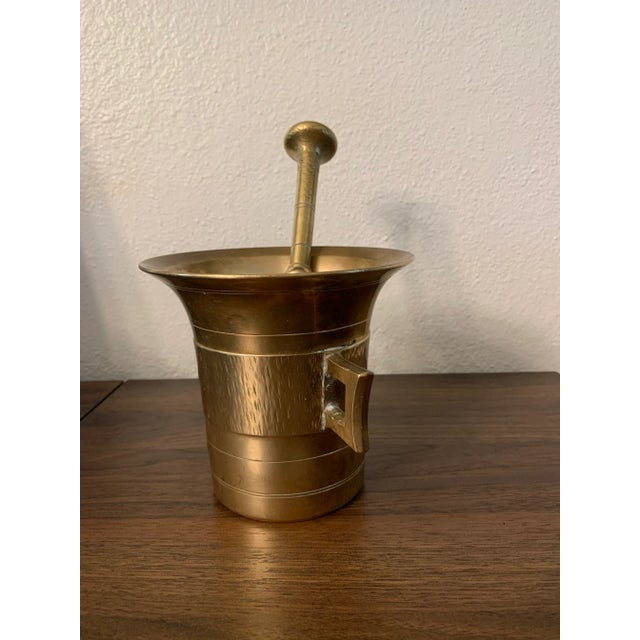Solid brass very heavy mortar and pestle. Early 20th century piece. Use for medicinal herbs or cooking herbs or just add...