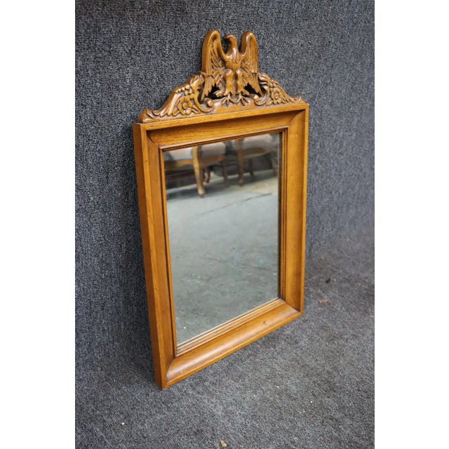 Rock maple mirror with carved eagle