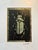 This original beetle print features a hand-carved block impression layered over subtle green-toned imagery, giving the...