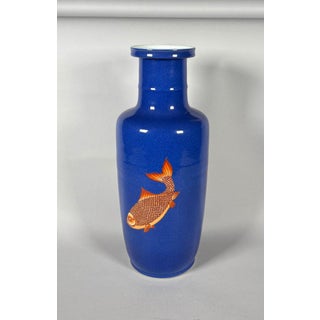 CHINA, 19th century. Porcelain vase with a scroll decorated with carp on a powder blue background. For Sale