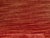 An Italian walnut bench from the early 19th century, with red fabric, petite tassels, turned legs and stretchers. Created...