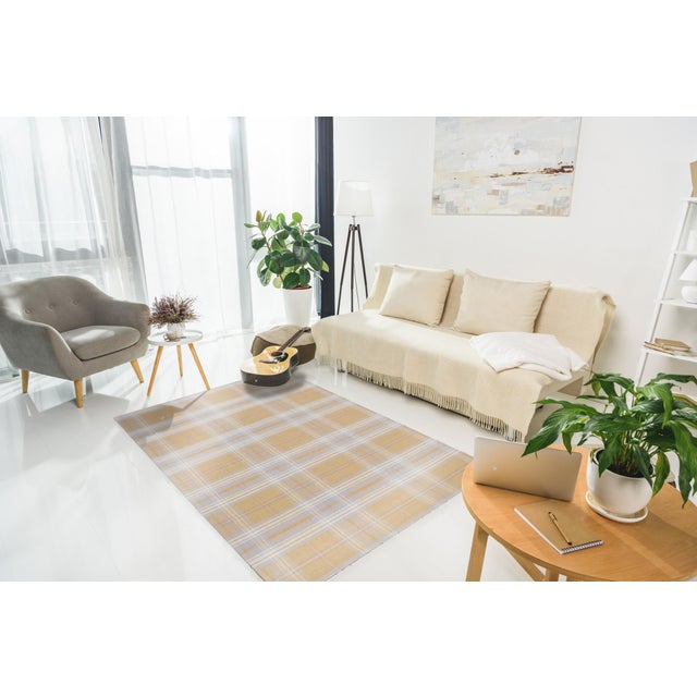 Sarrah Delicate Yellow Flatweave Wool Rug, Country of Origin: India. This exceptional flatweave piece offers a refined,...