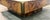 Striking Italian coffee table designed by Willy Rizzo, featuring richly figured burl wood with a glossy finish. The...