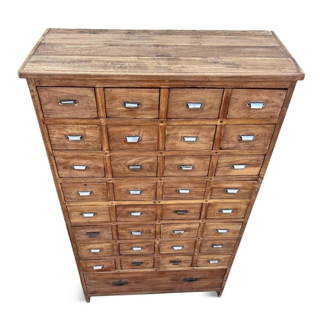 Vintage Colonial India storage dresser with 33 drawers. Beautiful solid teak wood well made quality with sturdy mortise...