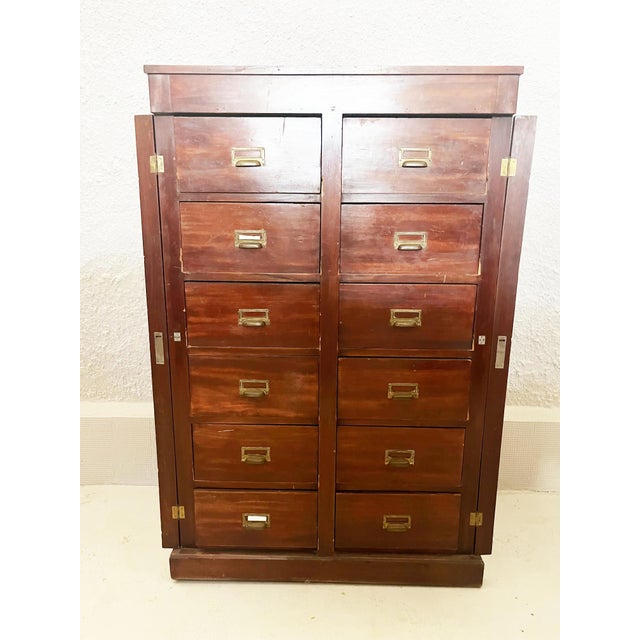 Early 20th century filing cabinet, document holder in mahogany stained wood with side strips Drawers with front opening...