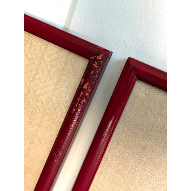 Antique Chinese ancestor portrait paintings in red wood frames; set of two. Some minor wear to frame in one area as shown...