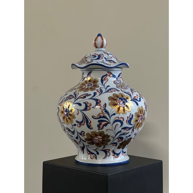 Decorative porcelain vase with lid, made by Manifattura Artistica le Porcellane in Florence. The vase has a rounded,...