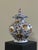 Decorative porcelain vase with lid, made by Manifattura Artistica le Porcellane in Florence. The vase has a rounded,...