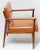 This rare walnut and leather lounge chair was made in Grand Rapids in the 50’s and designed by Giacomo Buzzitta for Stow...