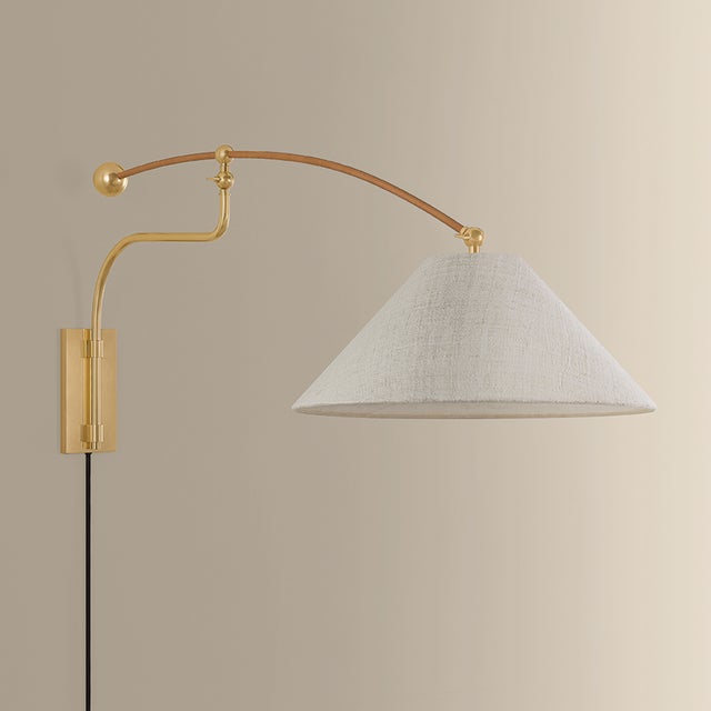 Sylva is an overscale articulating sconce that nods to mid-century design. Anchored by a counterweight-inspired sphere,...