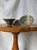 A vintage hand thrown set of three eclectic metallic raku ceramic bowls circa 1980s. A unique studio pottery set featuring...