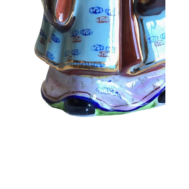 A great vintage Chinese God Of Happiness and Prosperity hand painted porcelain figurine. Please see pictures for...