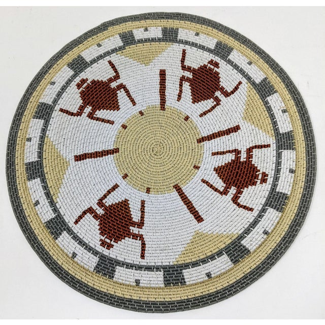 A vintage handmade wire plate that has been handcrafted by Zulu women of South Africa. The Zulus are the largest tribe in...