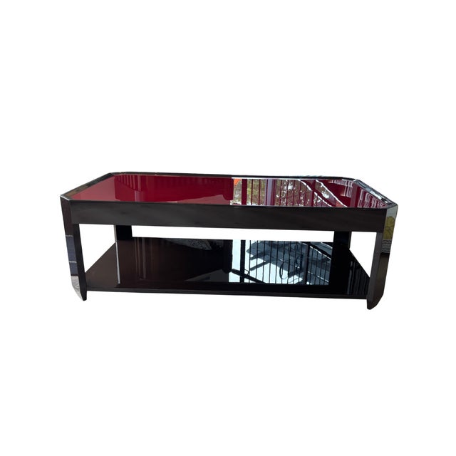 An elegant and refined table with an inset geometric top and lower shelf, available in a range of two-tone colourways. The...