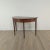 A Georgian mahogany demilune table, England circa 1800.