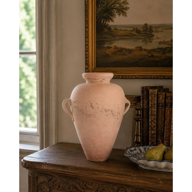 A striking mid-20th century Italian scavo glass vase inspired by ancient Roman amphora forms. The softly rounded body,...