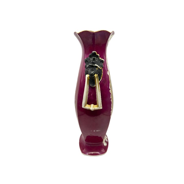 An exquisite 19th-century Vieux Paris (Old Paris) style porcelain vase featuring a vibrant raspberry-pink ground,...