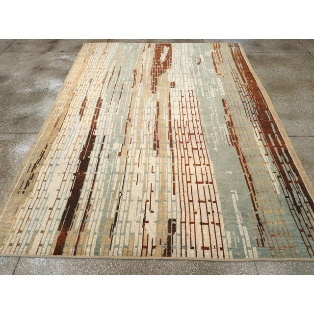 A vintage French Art Deco small room size carpet handmade during the mid-20th century. Measures: 7' 7" x 10' 4"