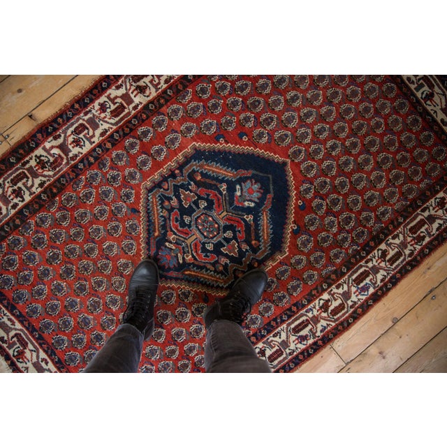 :: Shield-like center medallion with interior floral design and stepped contour main outlines atop a covered alternating...