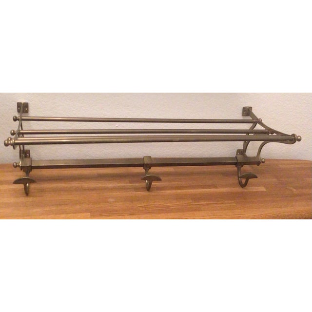 With a nod to the French Brasseries, this rare elegant suitcase and coat rack will elevate the style of any entryway. The...