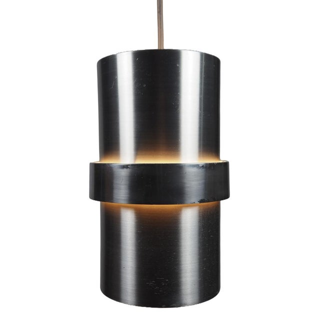 A striking Swedish pendant lamp designed by Carl Thore for Granhaga Metallindustri in the 1960s, executed in black...