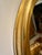 1950s Vintage Oval Italian Giltwood Mirror With Brass Loop Finial For Sale - Image 5 of 11