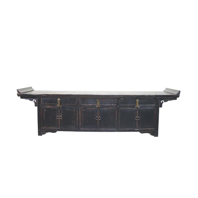This early 19th century low altar sideboard was handmade from sturdy elm around early 19th century. Refinished in black....