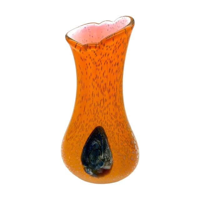 This vintage Art Glass vase is a beautiful piece of mid-century modern art. The vase is made of hand-blown glass with a...