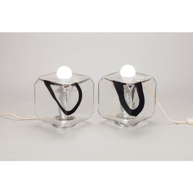 Pair of Murano blown glass table / wall lamps with amaranth stripes. Production Fratelli Toso, Murano, Italy 1970s Part of...