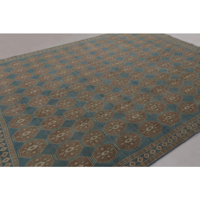 Hand-knotted in premium Ghazni wool, this 9x13 rug is a premier selection from Rug & Kilim’s custom-classics Burano...