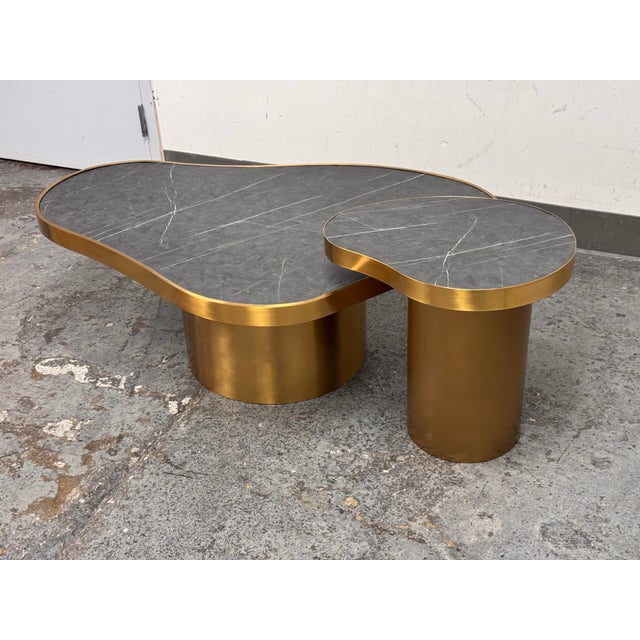 Design Plus Gallery presents a Kidney Shaped Coffee Table + Side Table from Michael Oren Design. The tops of each are of...